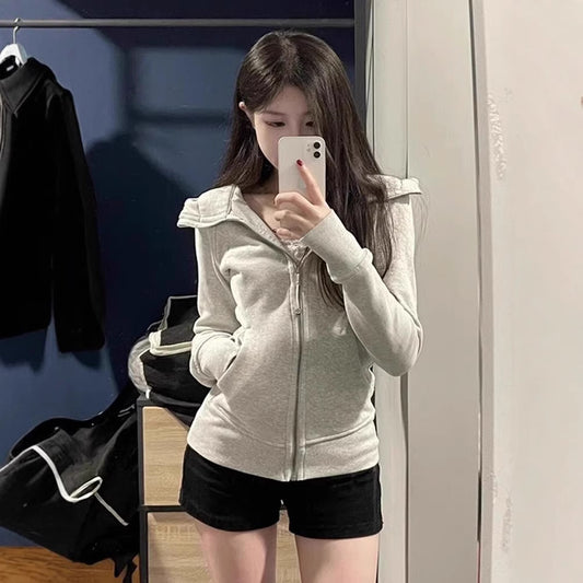 Cardigan med lynlås, hætte og fingerløkker – taljefremhævende slim fit