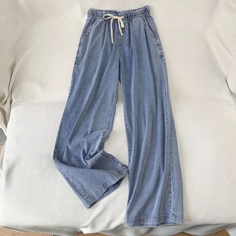 Damebukser i denim med snøre og brede ben