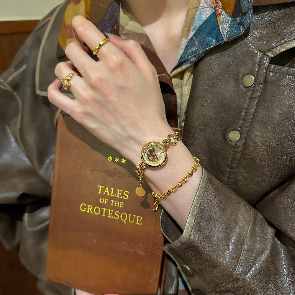 Retro Mid-centurystyle Gold Bracelet Watch With A Niche Design-forward Aesthetic