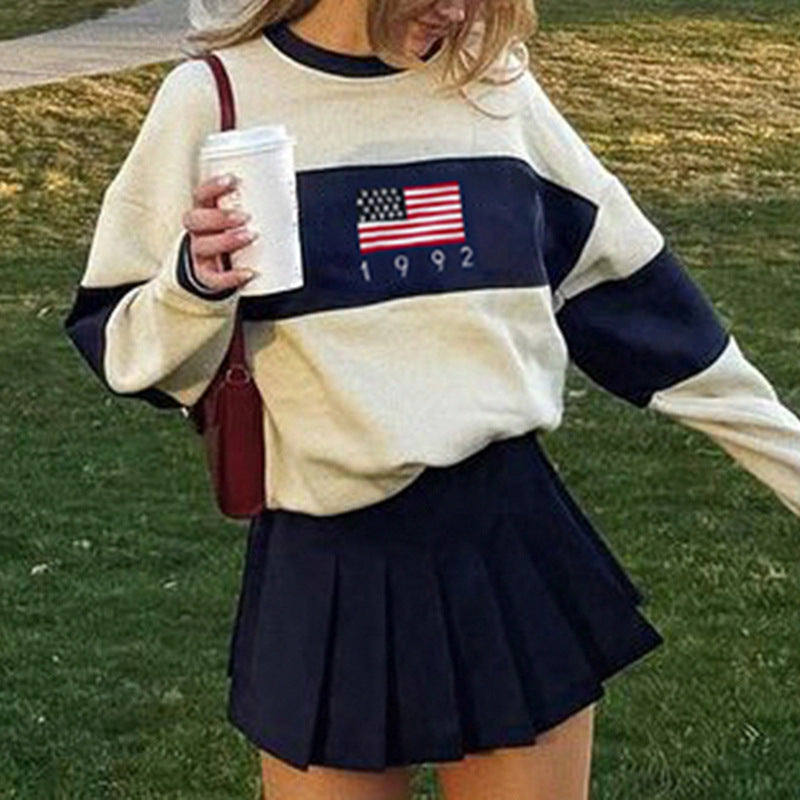 Rundhalset uldtop med lange ærmer i amerikansk preppy stil