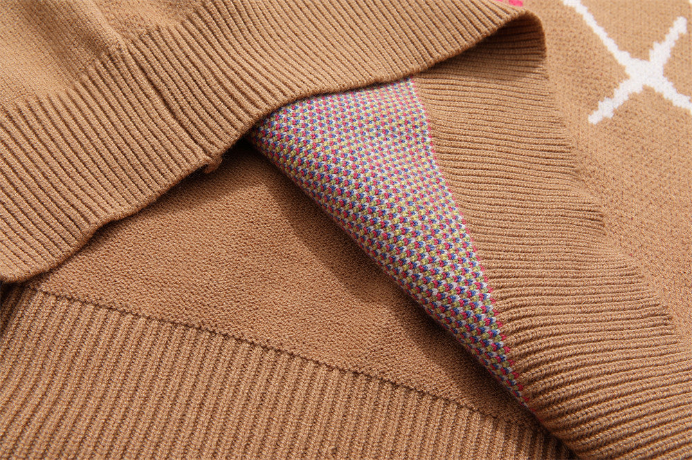 Striktrøje med stjernekors og rund hals fra Trendy Brand