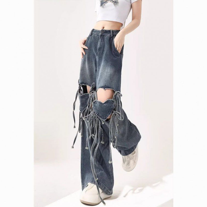 Damehøjtaljede jeans med kærlighedsremdesign