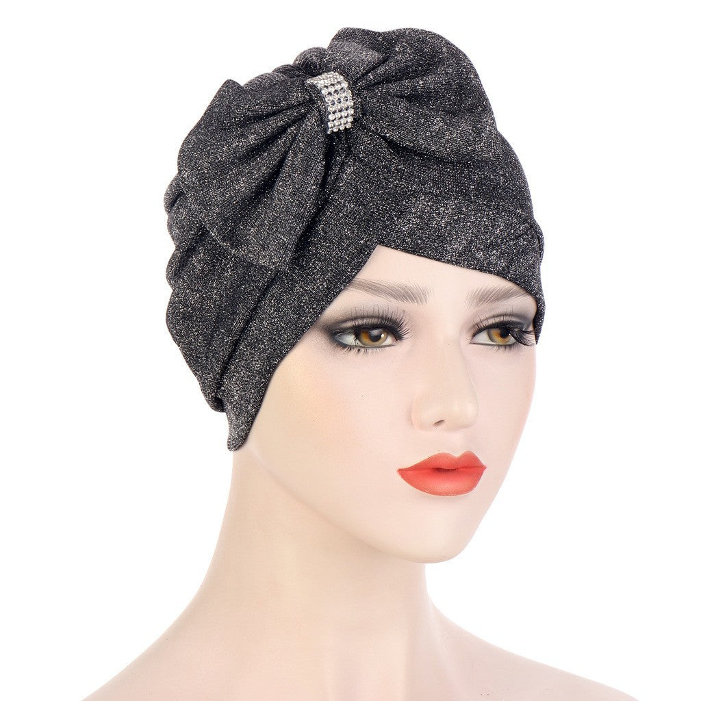 Headband Hat With A Large Cross Bow On The Forehead