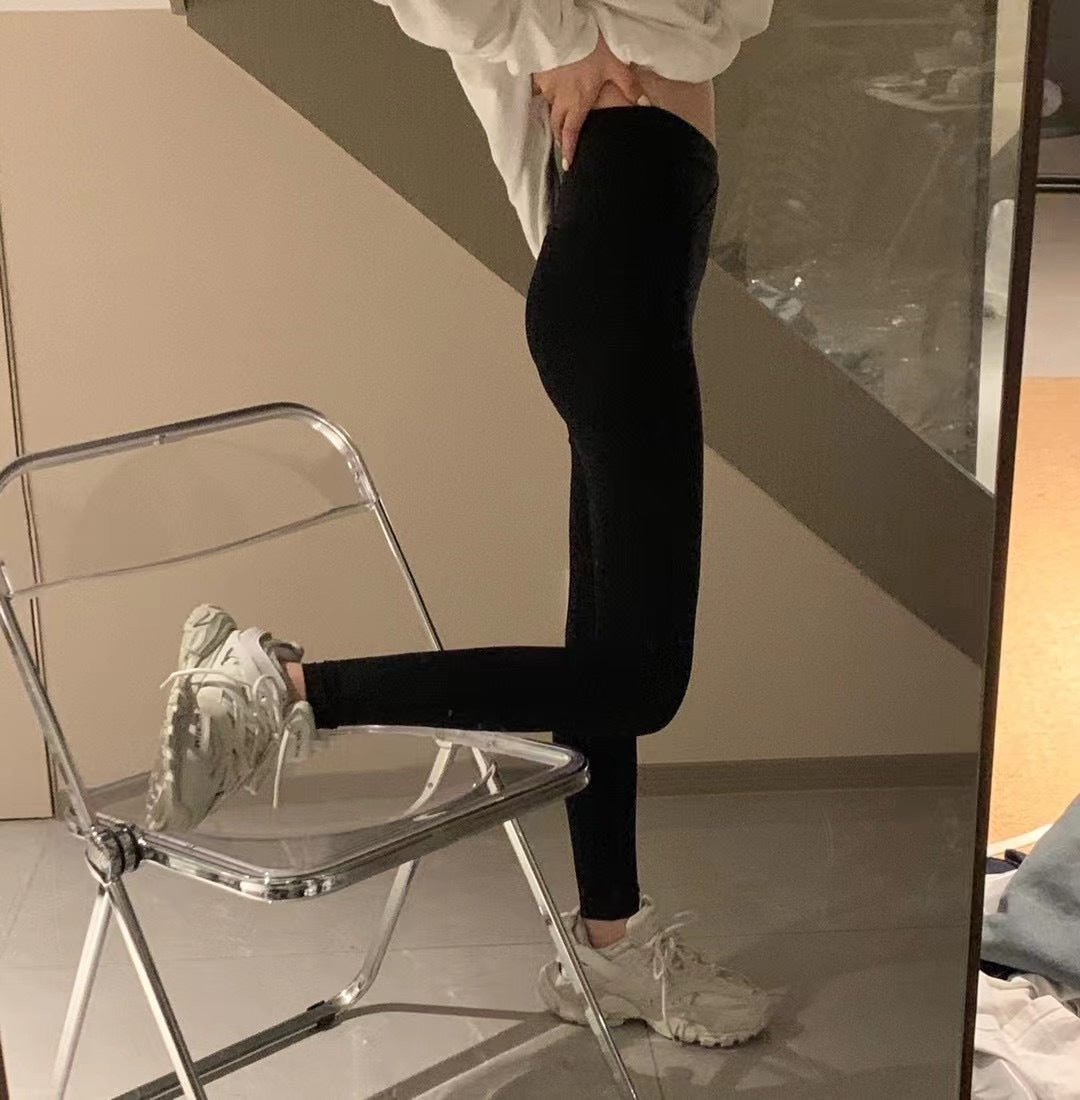 Dame-leggings med kryds i taljen i hajskindsstof