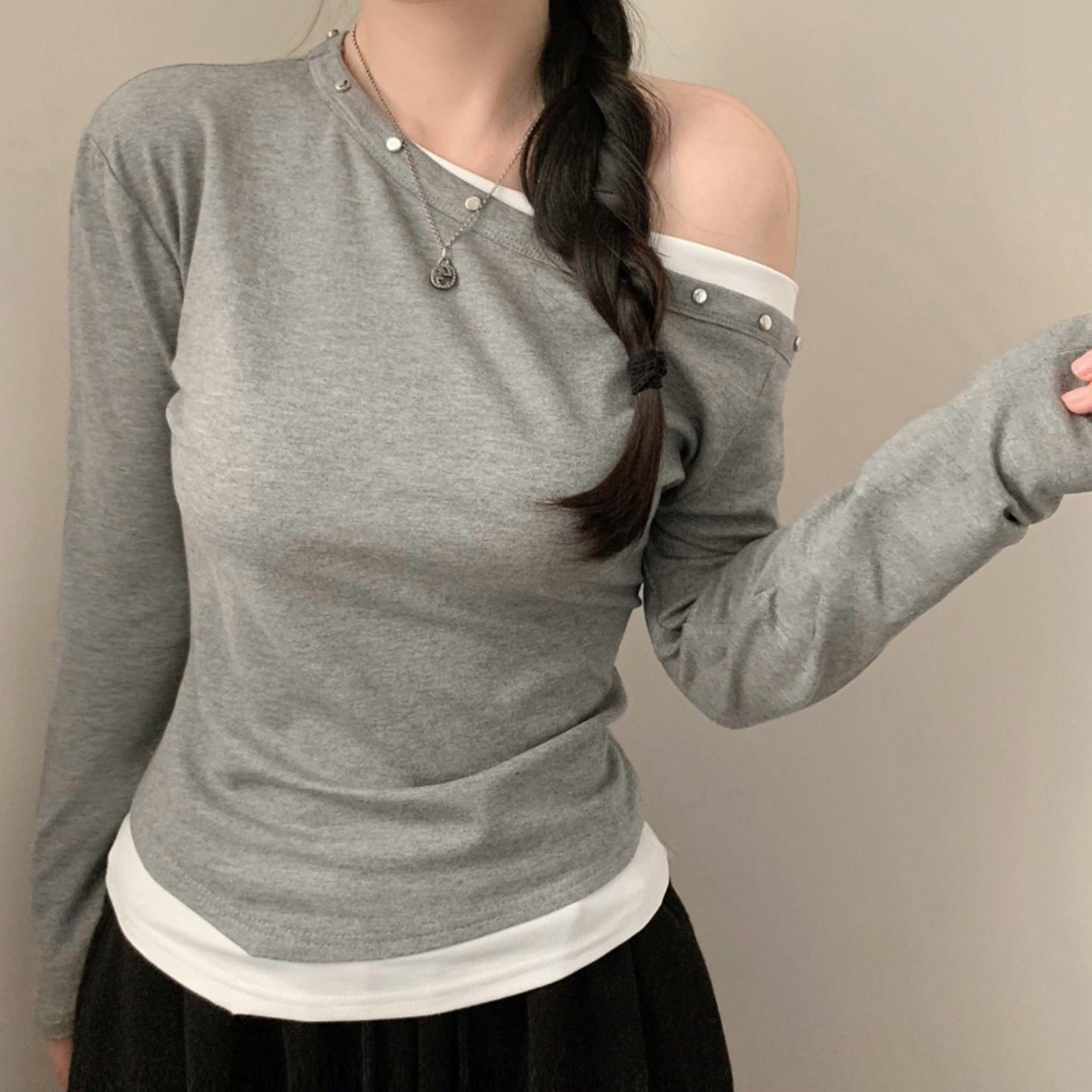 Designed As A Faux Two-piece This T-shirt Features A Slanted Shoulder And Contrasting Colors