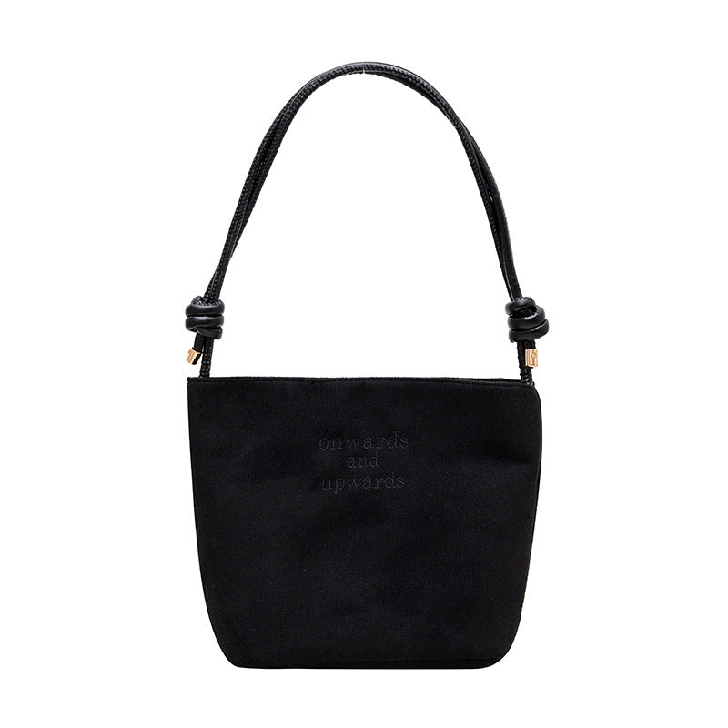 Ny skuldertaske i vintage ruskind til kvinder – en supertrendy must-have bucket-taske