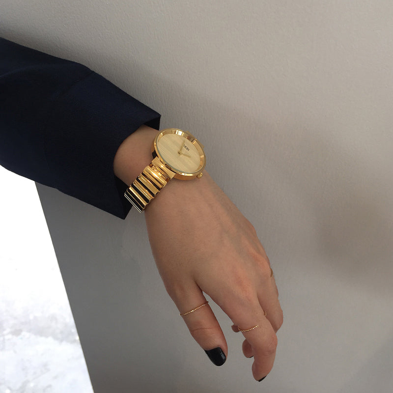 Golden vintage small gold watch