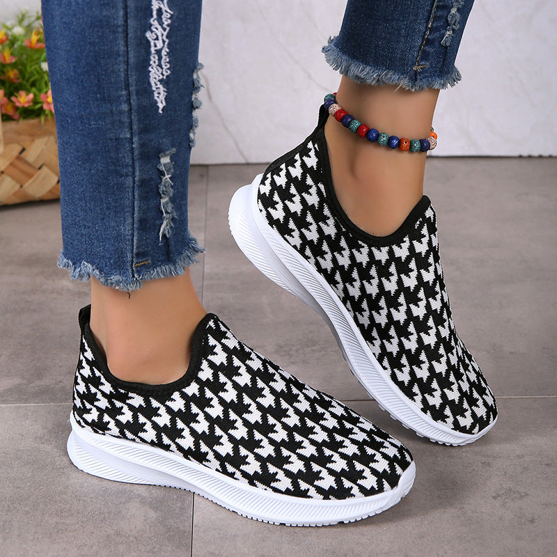 Houndstooth-mønstrede sneakers med rund snude og mesh-flade sko