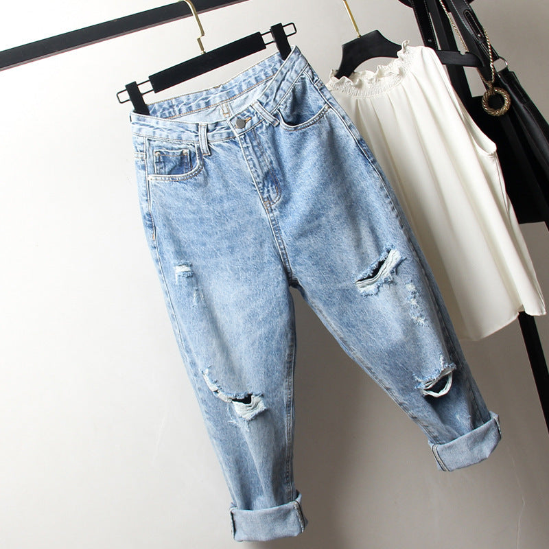Oversized women's ripped jeans