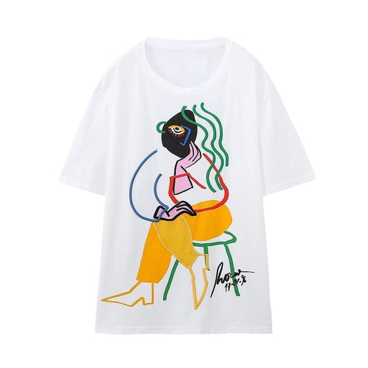 Dame T-shirt med rund hals og korte ærmer i farve- og printkontrast