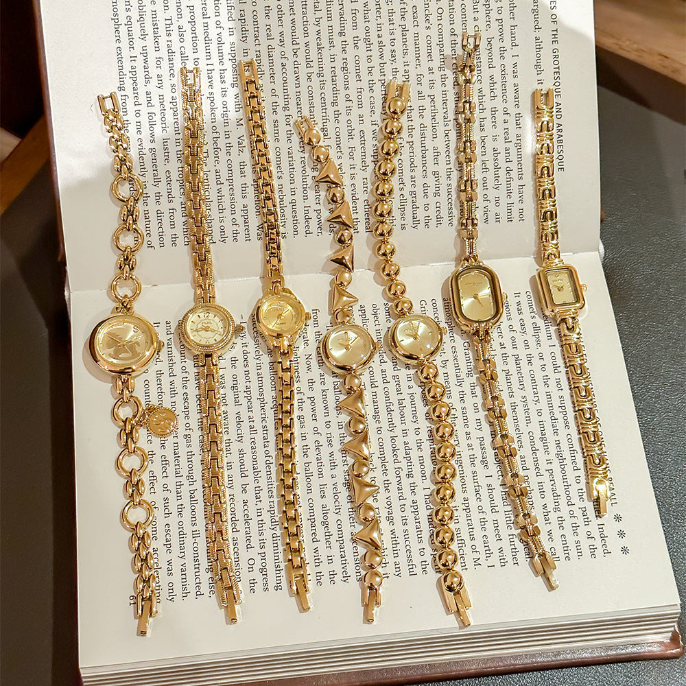 Retro Mid-centurystyle Gold Bracelet Watch With A Niche Design-forward Aesthetic