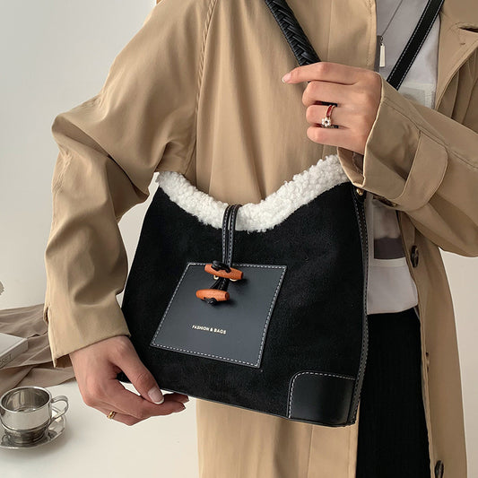 Design en lille skuldertaske med én skulderrem