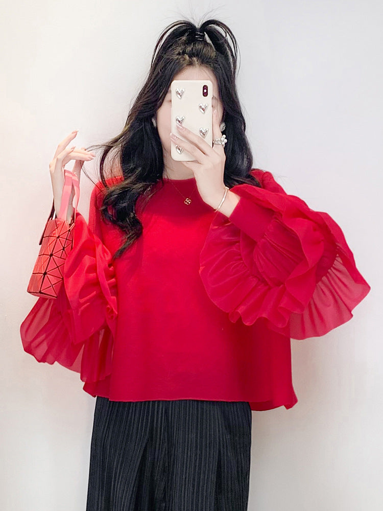 Versatile Ruffled Blouse With Puff Sleeves And A Round Neckline