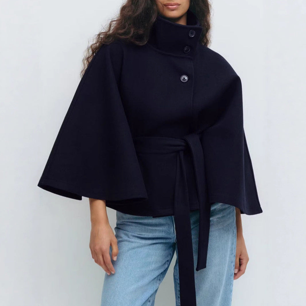 Trench Coat With A Stand-up Collar Buttons And A Belt