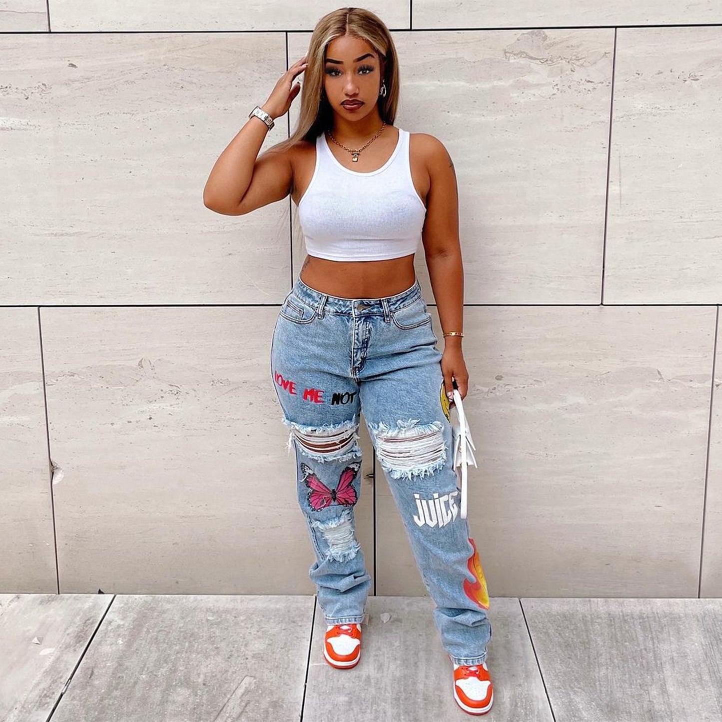 Kvinder digitalt placeret print ripped fashion jeans