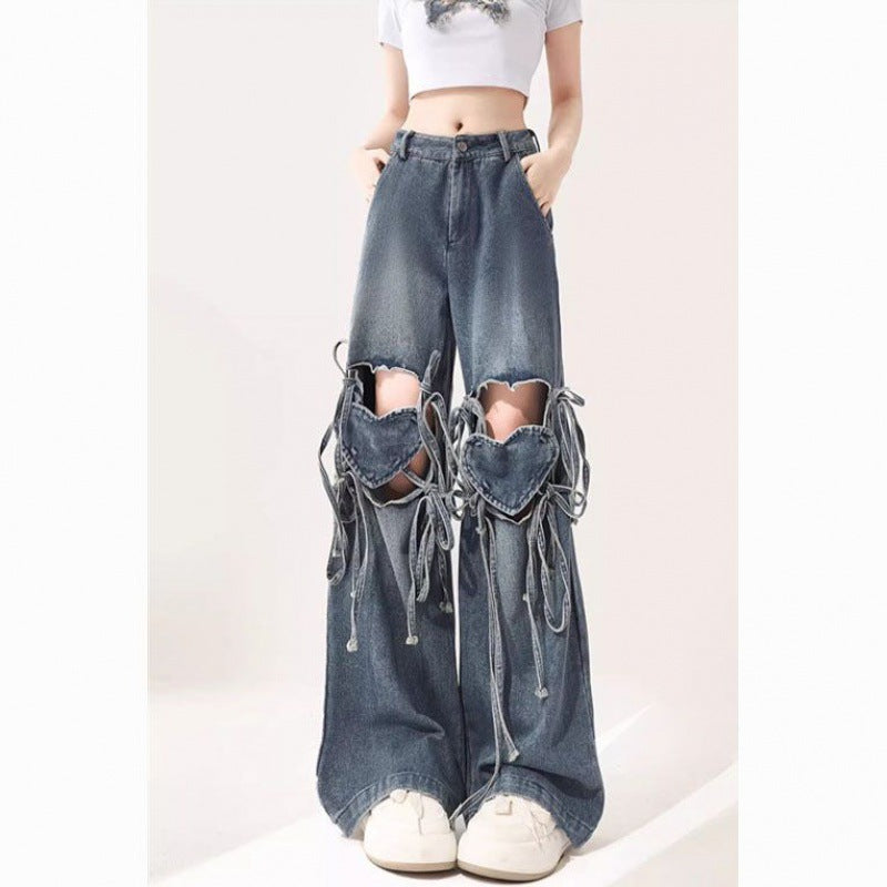 Damehøjtaljede jeans med kærlighedsremdesign
