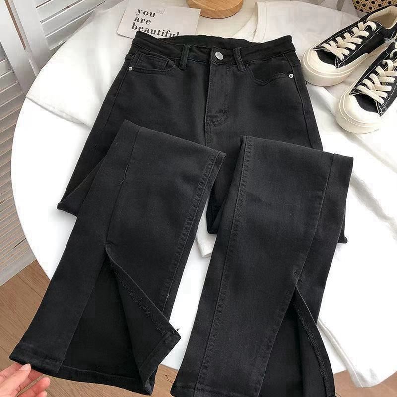 High-waisted Denim Jeans With A Slit At The Hem For Women