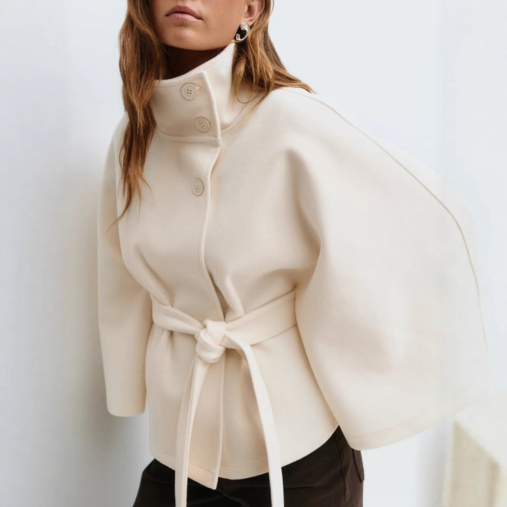 Trench Coat With A Stand-up Collar Buttons And A Belt