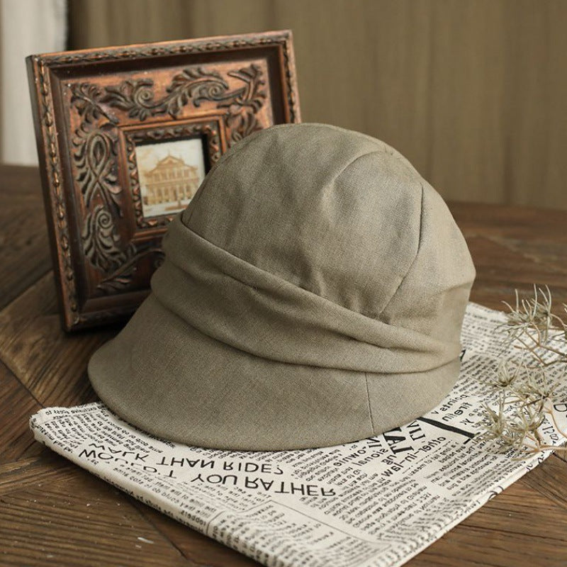 Kunstnerisk afslappet bøllehat med top og krøllet vintage-look