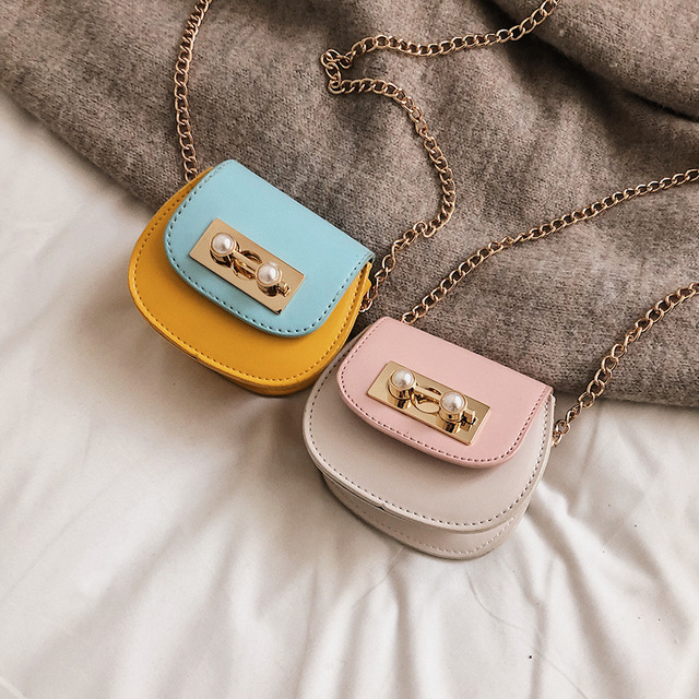 Contrasting mini saddle bag