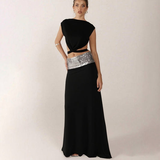 And Elegant Backless Top Paired With A Patchwork Maxi Skirt