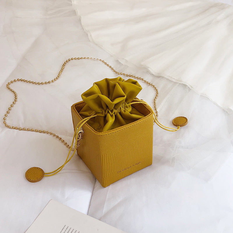Chain drawstring crossbody bag