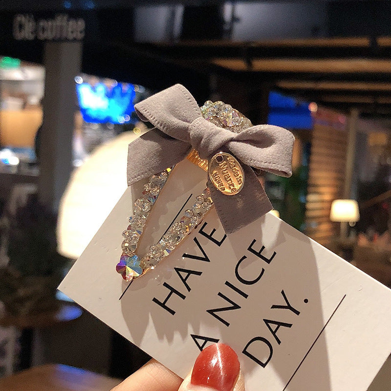Cute bow rhinestone bangs clip