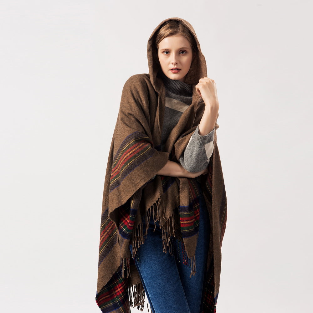 Keep warm by adding a stylish hooded cape