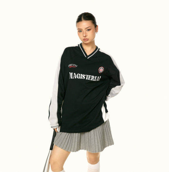 Amerikansk afslappet langærmet overdel med syninger og raglan i sportsstil
