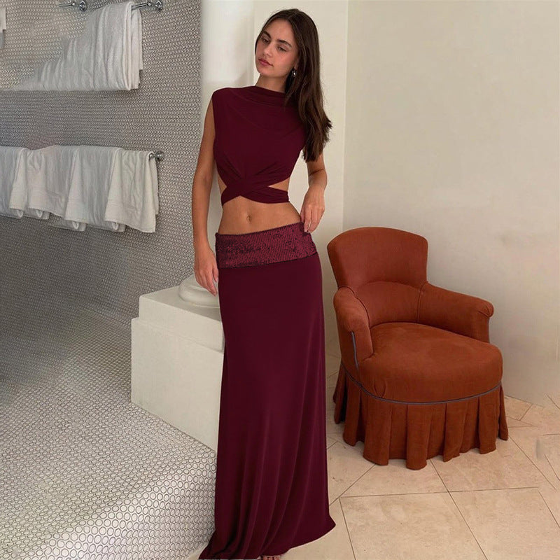 And Elegant Backless Top Paired With A Patchwork Maxi Skirt