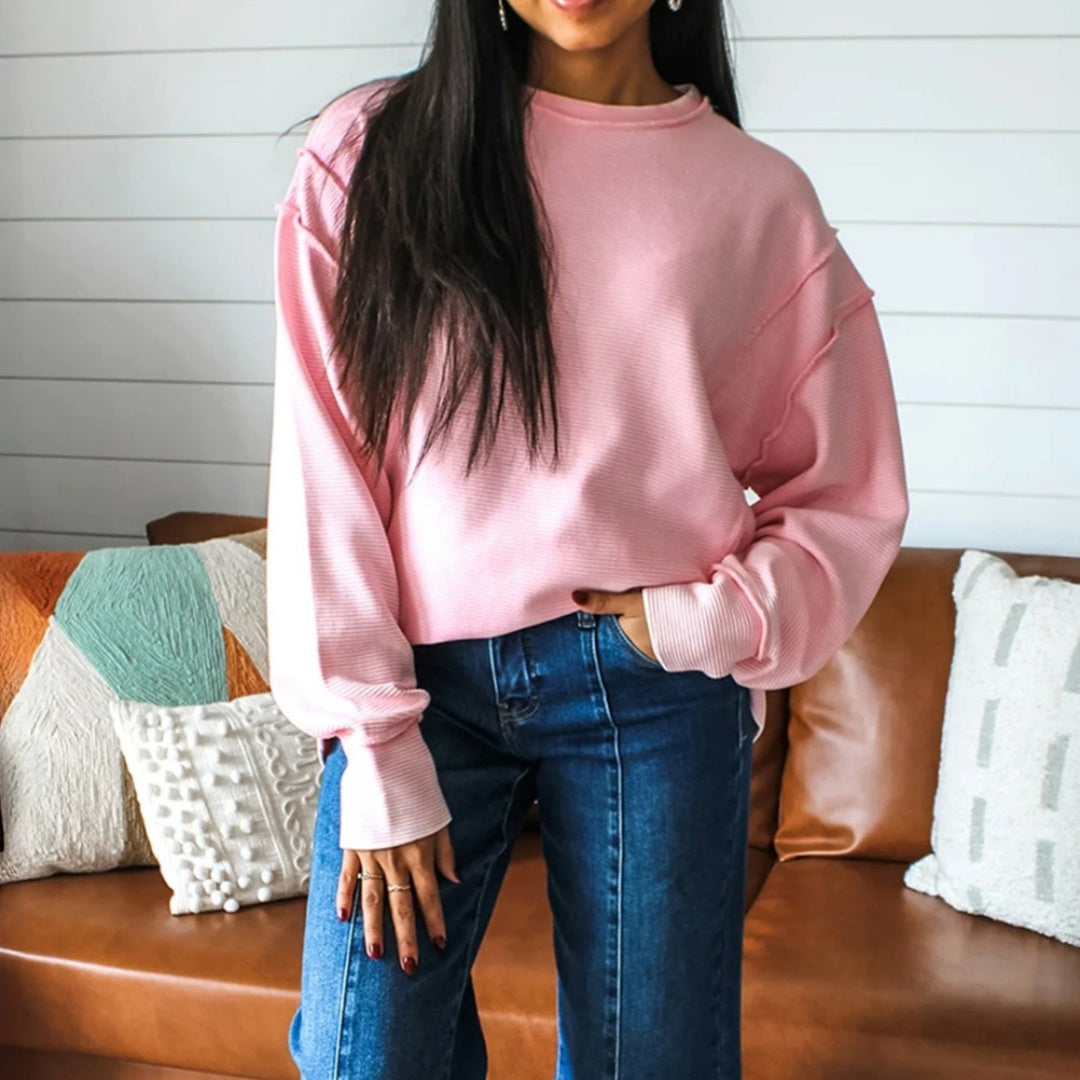 Ensfarvet sweatshirt til kvinder med rund hals, lav skuldersøm og lange ærmer