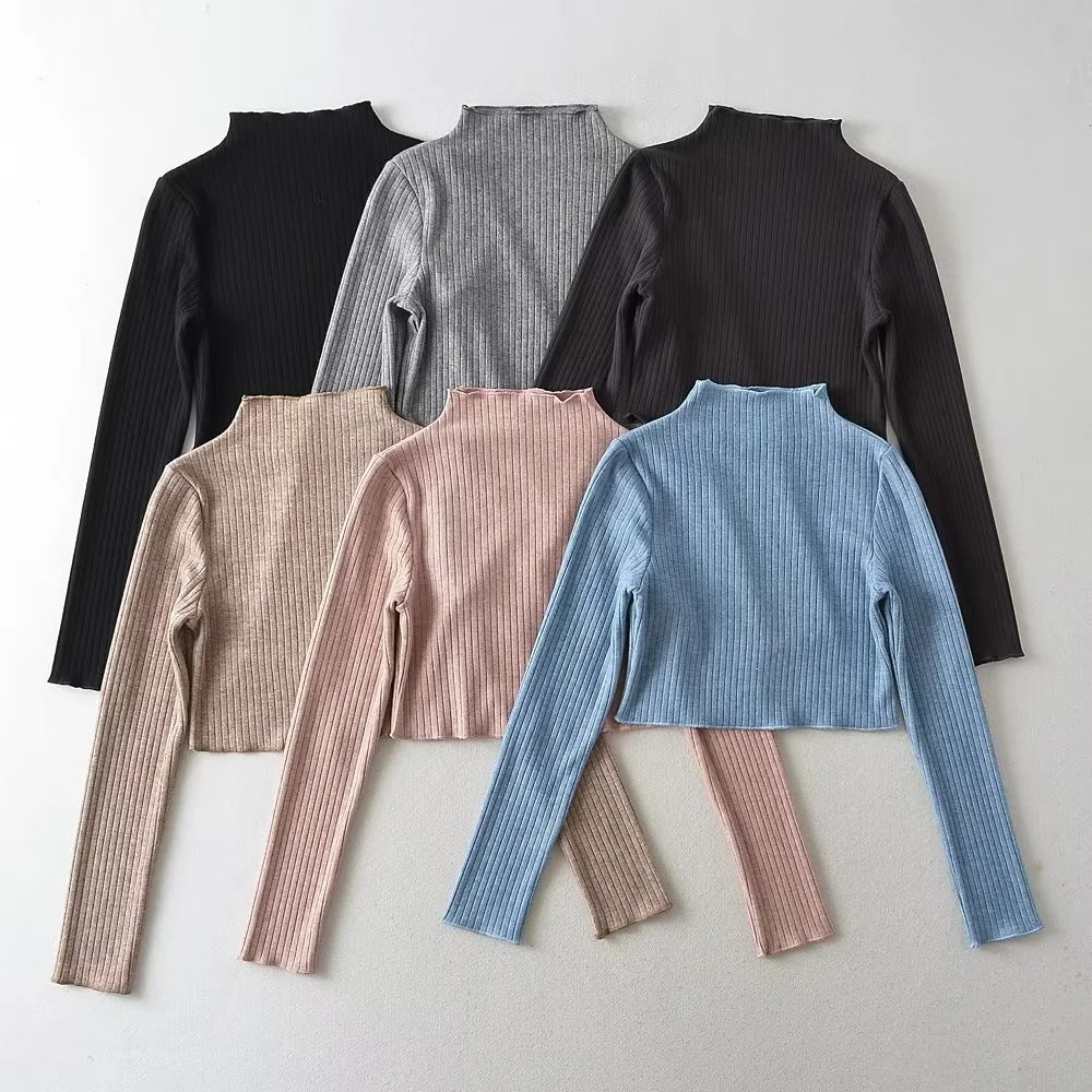 Cashmere-trøje med blondedetaljer ved halsudskæringen, lange ærmer og som underlag