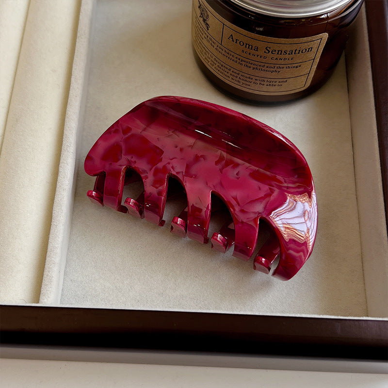 White Dragon Fruit Colored Hair Clip With A Spoon On The Back Of The Head