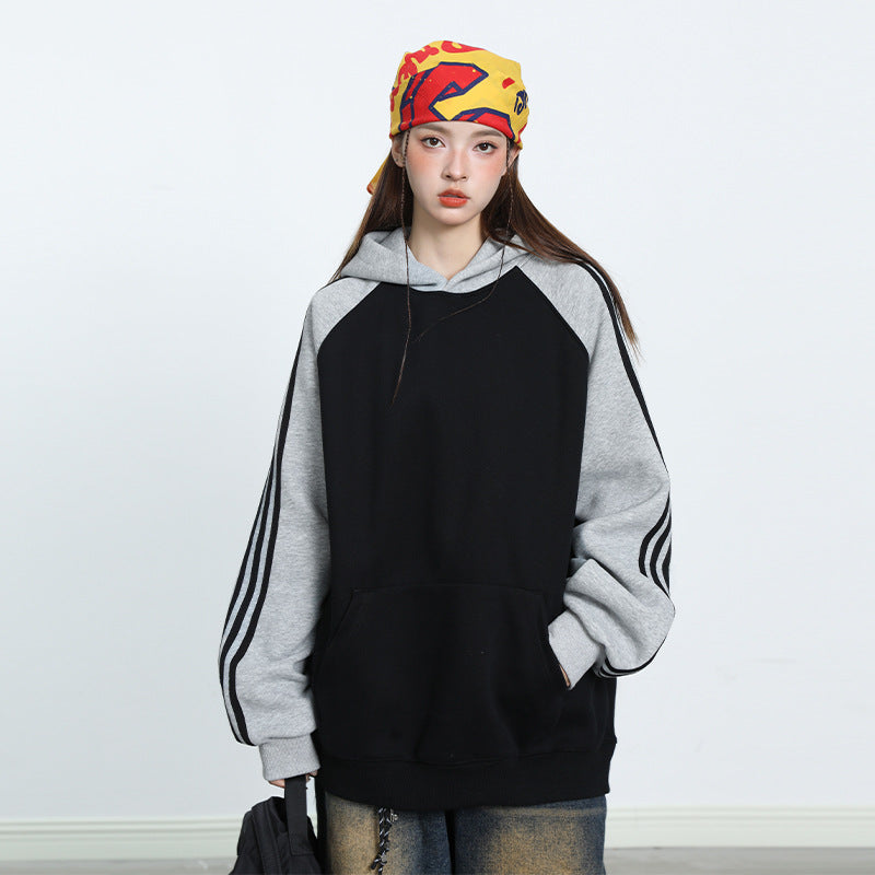 Herre- og dame-stribet kontrastfarve syet raglan-top