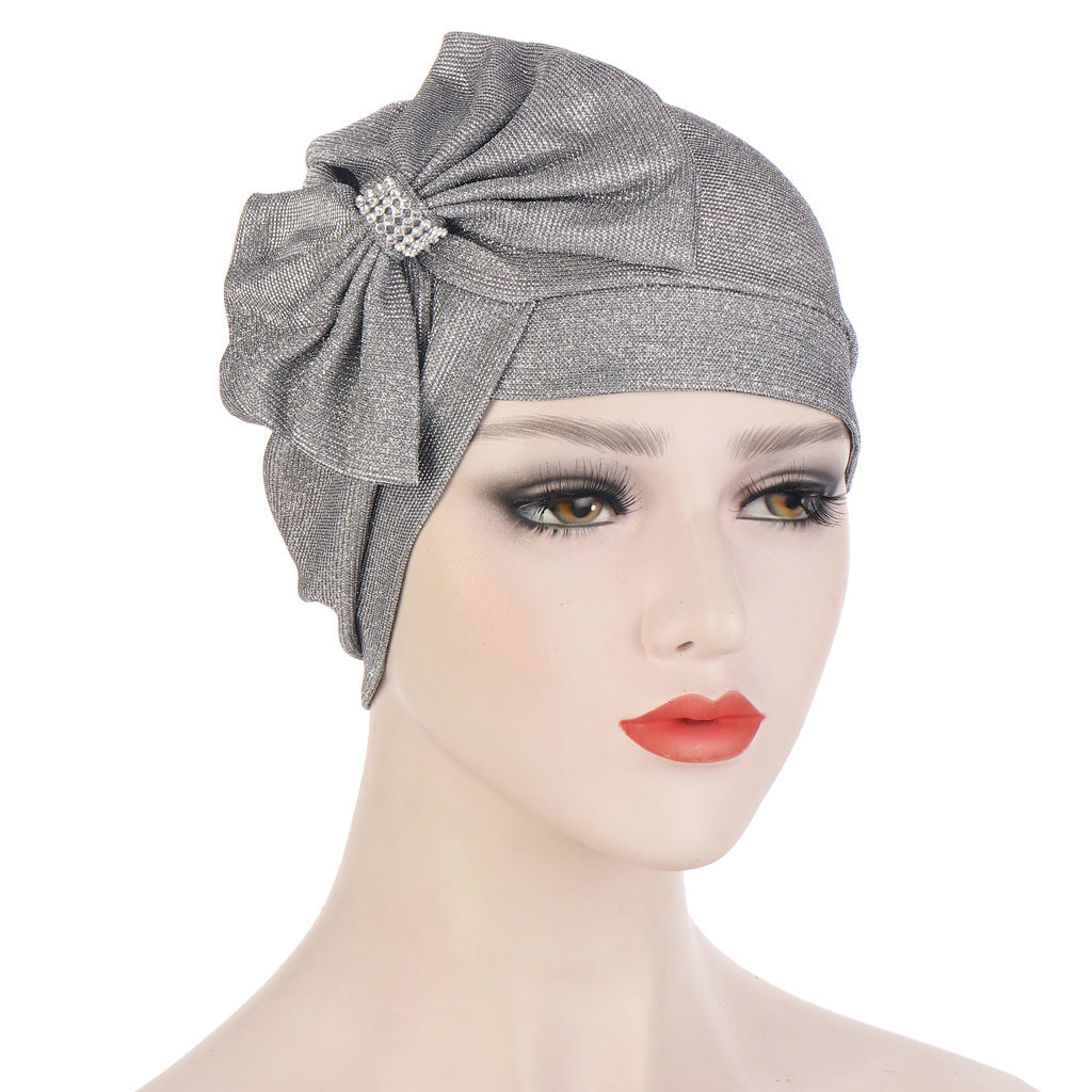 Headband Hat With A Large Cross Bow On The Forehead