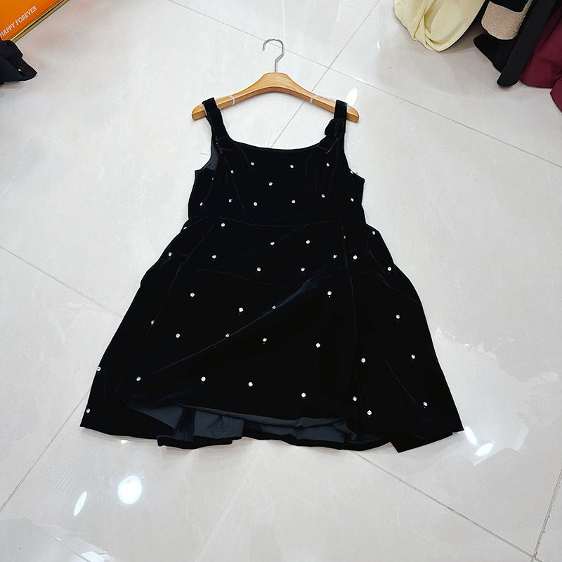 Fitted Black Dress With A Puffy Mini Skirt
