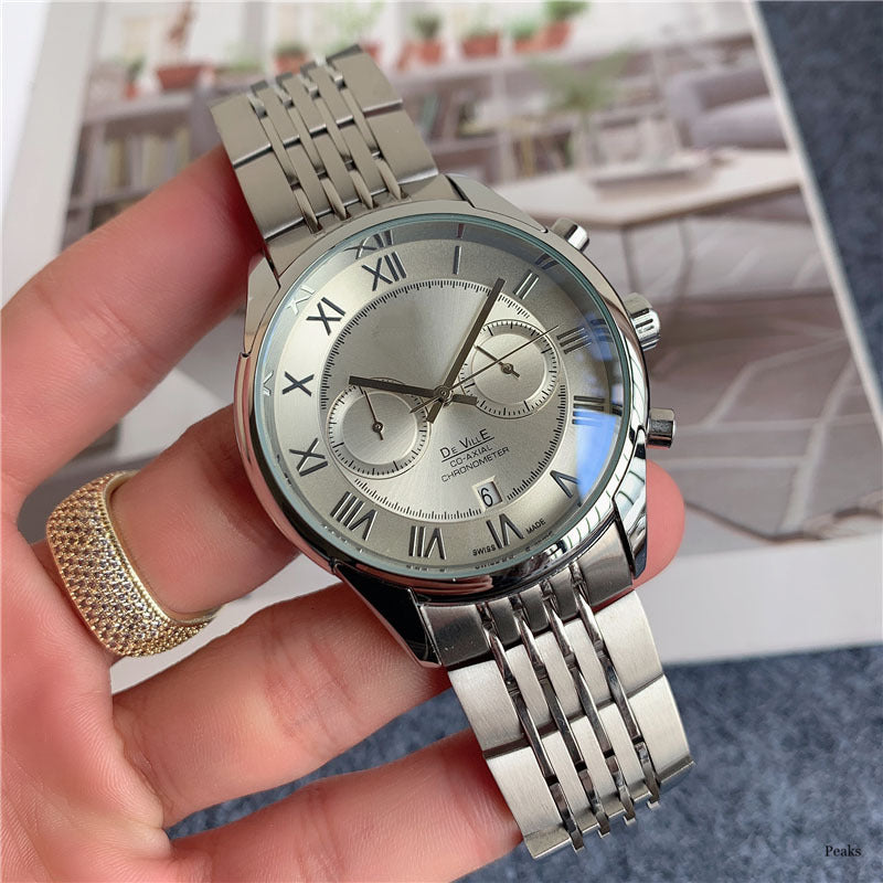 Moderigtigt armbåndsur i rustfrit stål med multifulle femvisere og kalender i trendy afslappet design