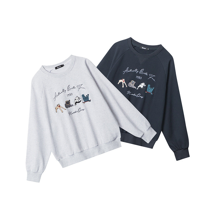 Rundhalset Løs Retrosweater Med Broderet Design Og Lange Ærmer