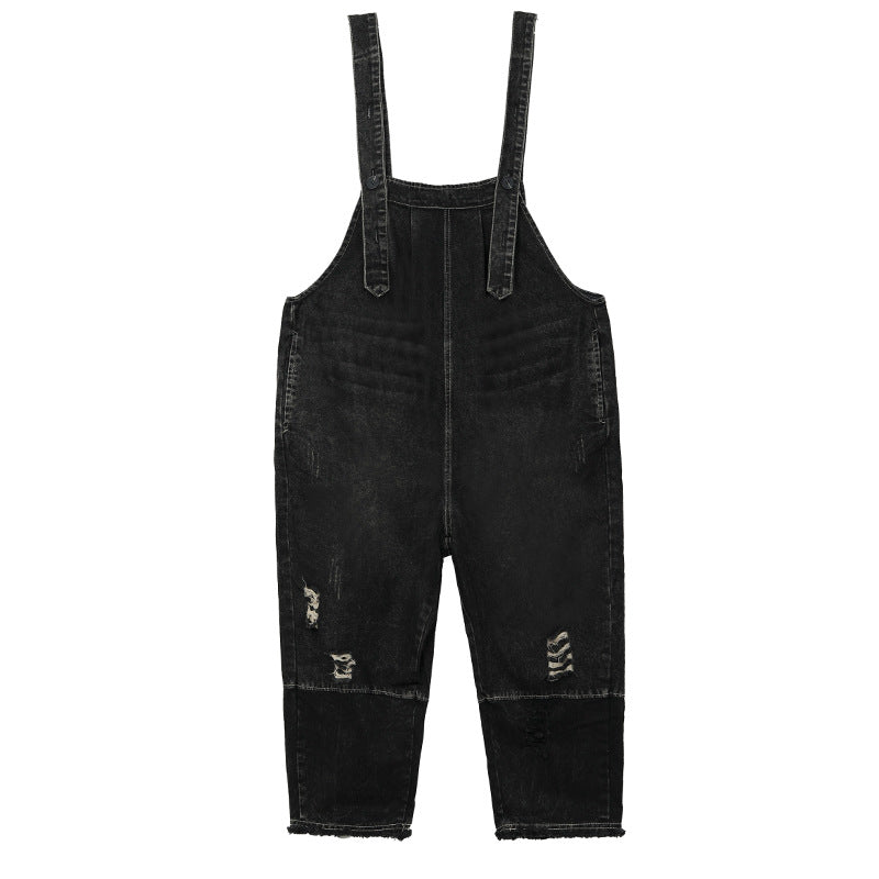 Moderigtige slidte denim-bukser med stropper