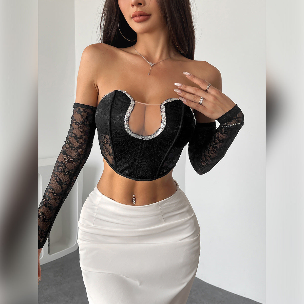 Figursyet off-shoulder langærmet rygløs top til kvinder