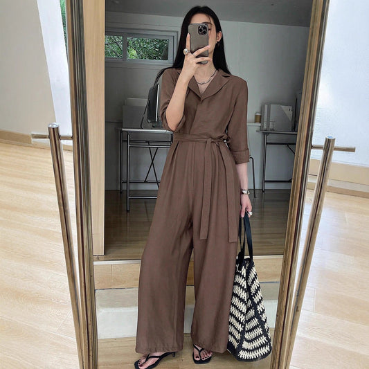 Elegant ensfarvet V-hals langærmet jumpsuit med snøre og brede ben