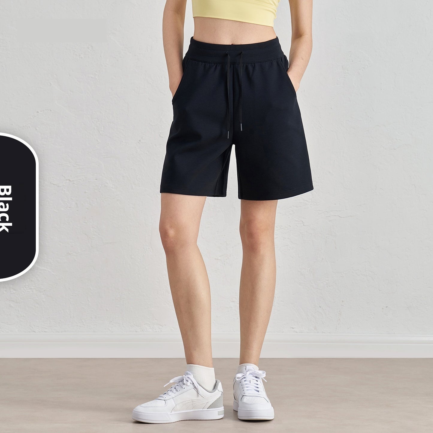 Løse løbeshorts med lagdelte, fempunkts fritidsfitnessshorts