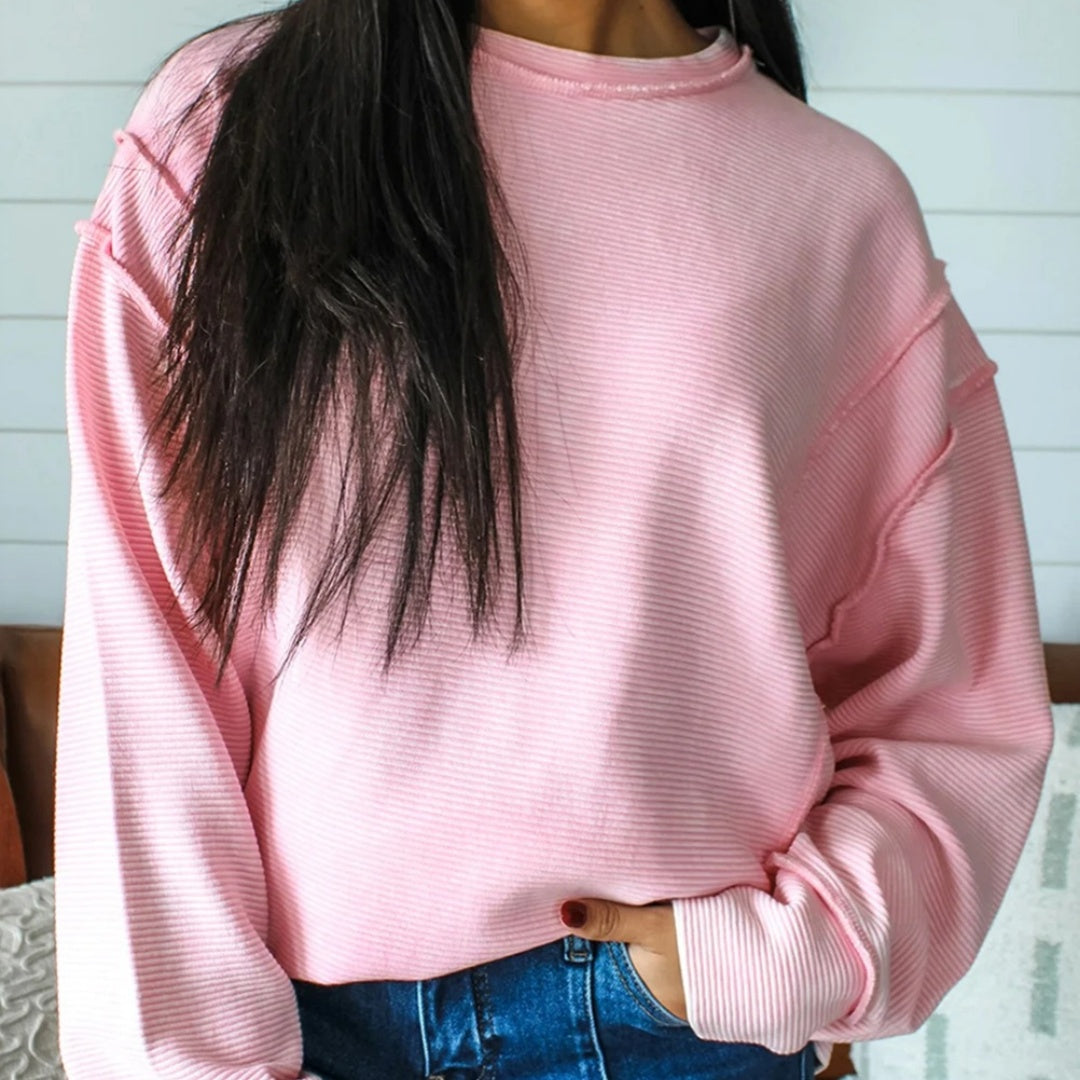Ensfarvet sweatshirt til kvinder med rund hals, lav skuldersøm og lange ærmer