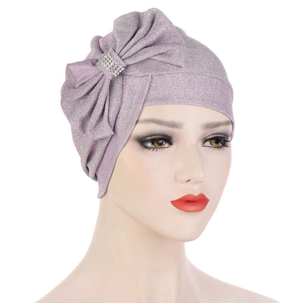 Headband Hat With A Large Cross Bow On The Forehead