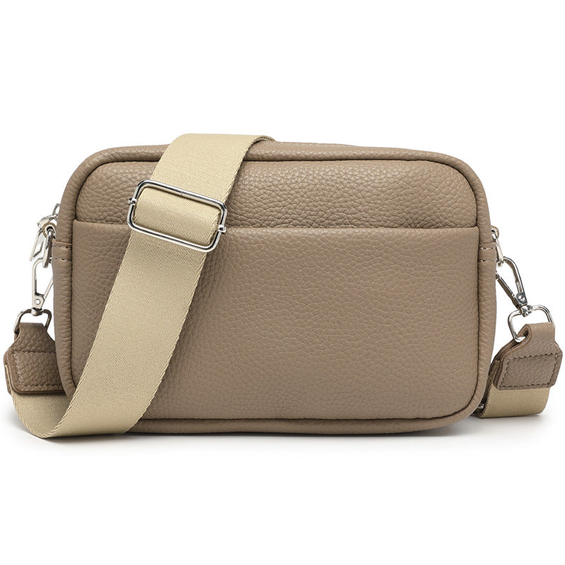 Crossbodytaske med bred skulderrem