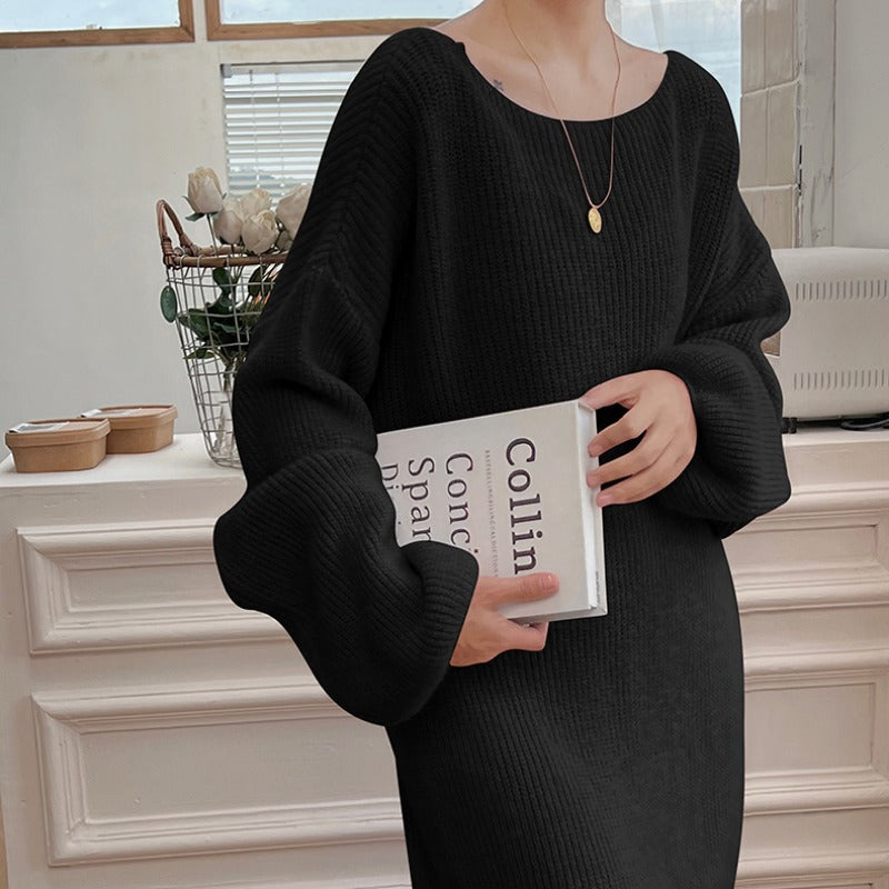 En knælang strikket sweaterkjole skaber et raffineret og elegant look til den moderne kvinde
