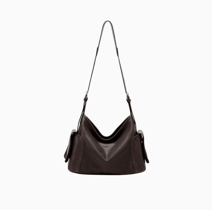 Stor crossbody-taske i ægte læder med to hanke