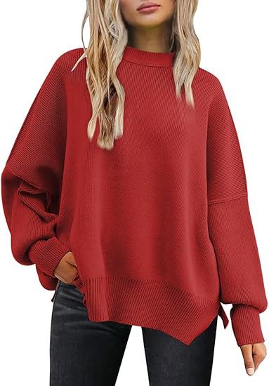 Strikket sweater med rund hals, løs pasform og slidser i siderne. Ensfarvet sweater med flagermusærmer til kvinder.