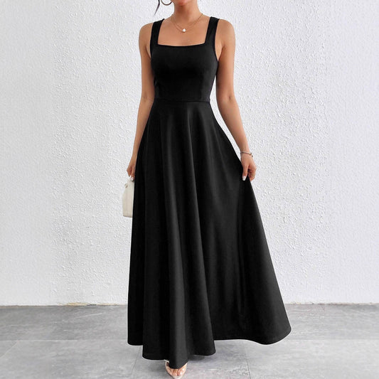 The Woman Is Wearing A Sleeveless Solid-color Dress