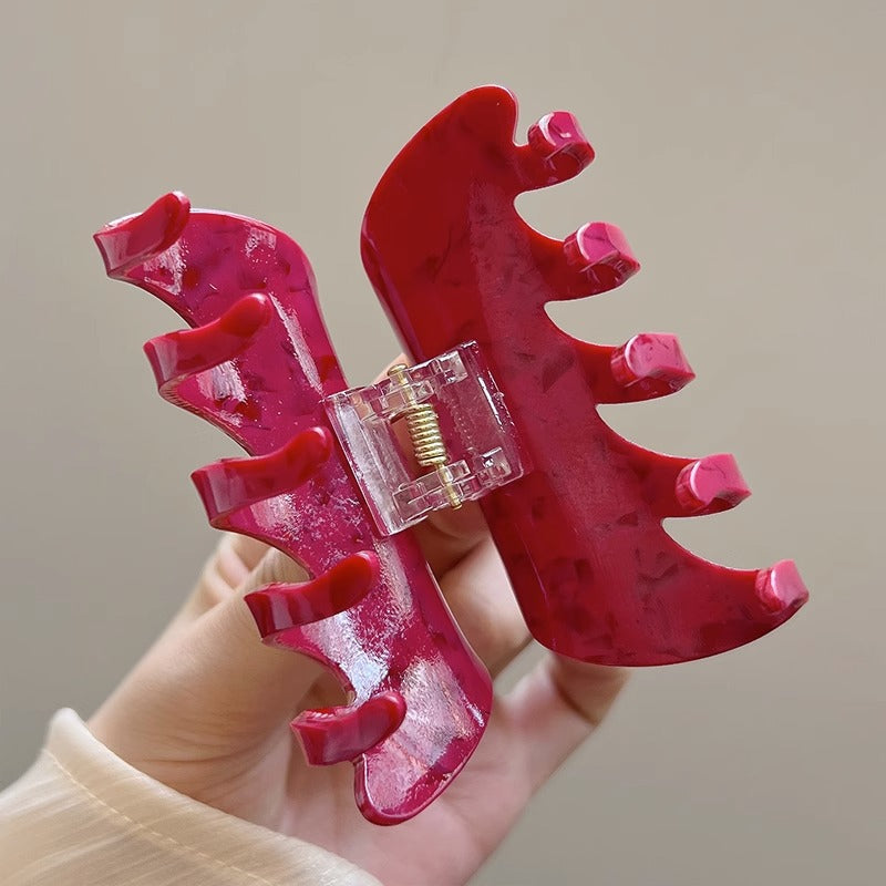 White Dragon Fruit Colored Hair Clip With A Spoon On The Back Of The Head